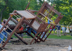 a group of people razing playground equipment 
