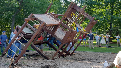 a group of people razing playground equipment